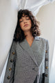 Front view of model wearing the Asymmetrical Blazer.